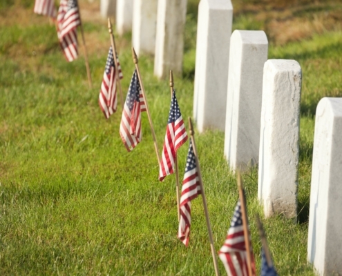 American Flags Near Gravestones at Arlington National Cemetery