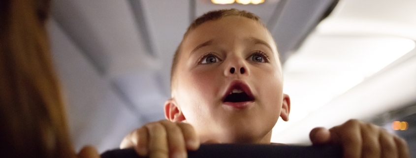 Kid on airplane talking