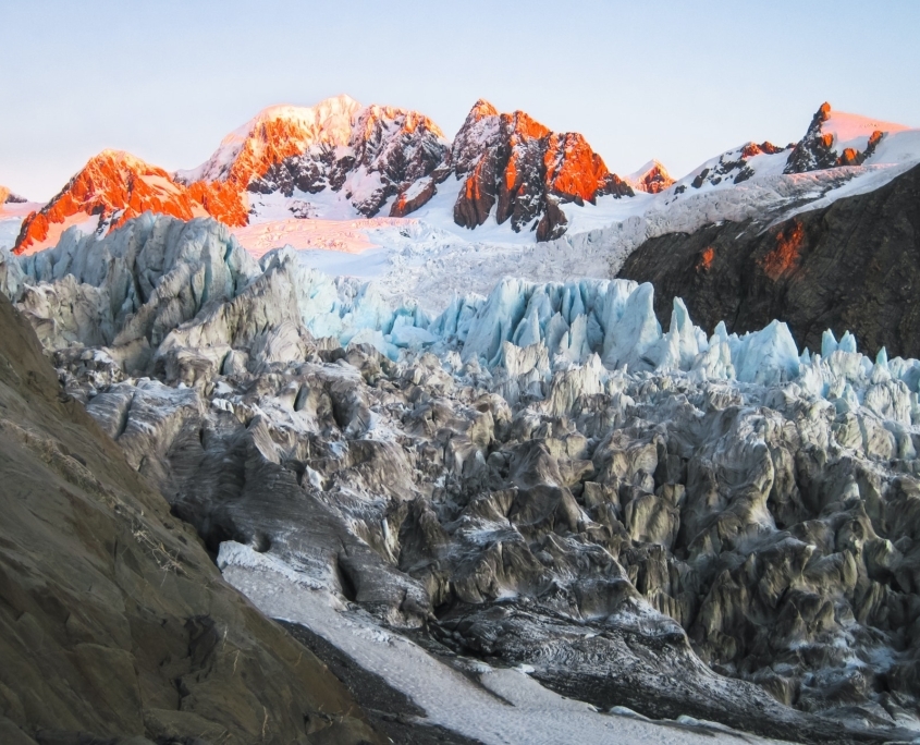 Fox Glacier and Surrounding Peaks at Sunset in New Zealand