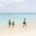mother and her children walking the beach, Grand Cayman Island