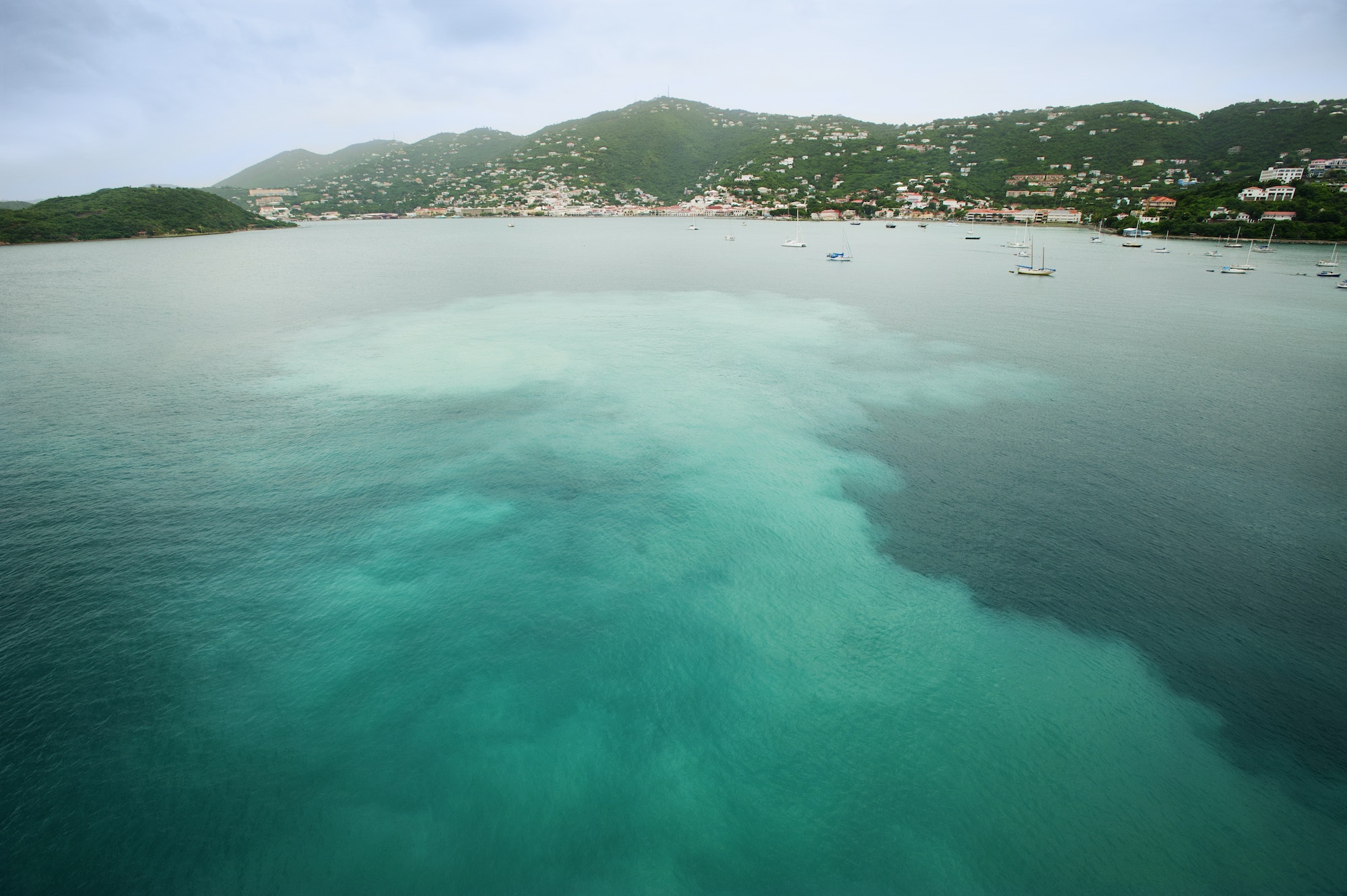 Scenic View Of Ocean By Mountains At Virgin Islands